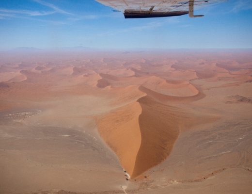 a bird's eye view of Namibia's sand dunes from a small charter flight over the sand dune sea