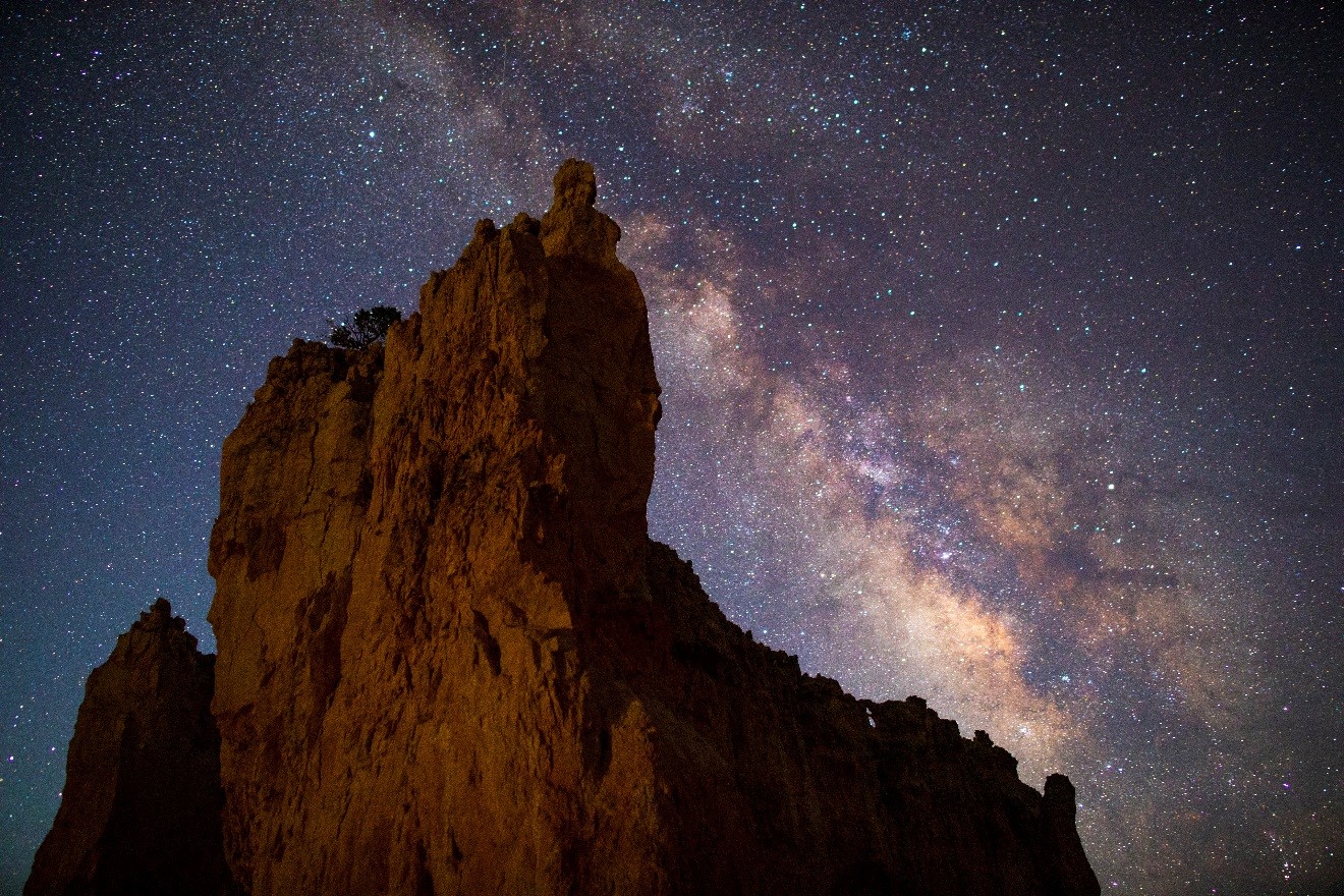 a night photo of the milky way over bryce canyon national park