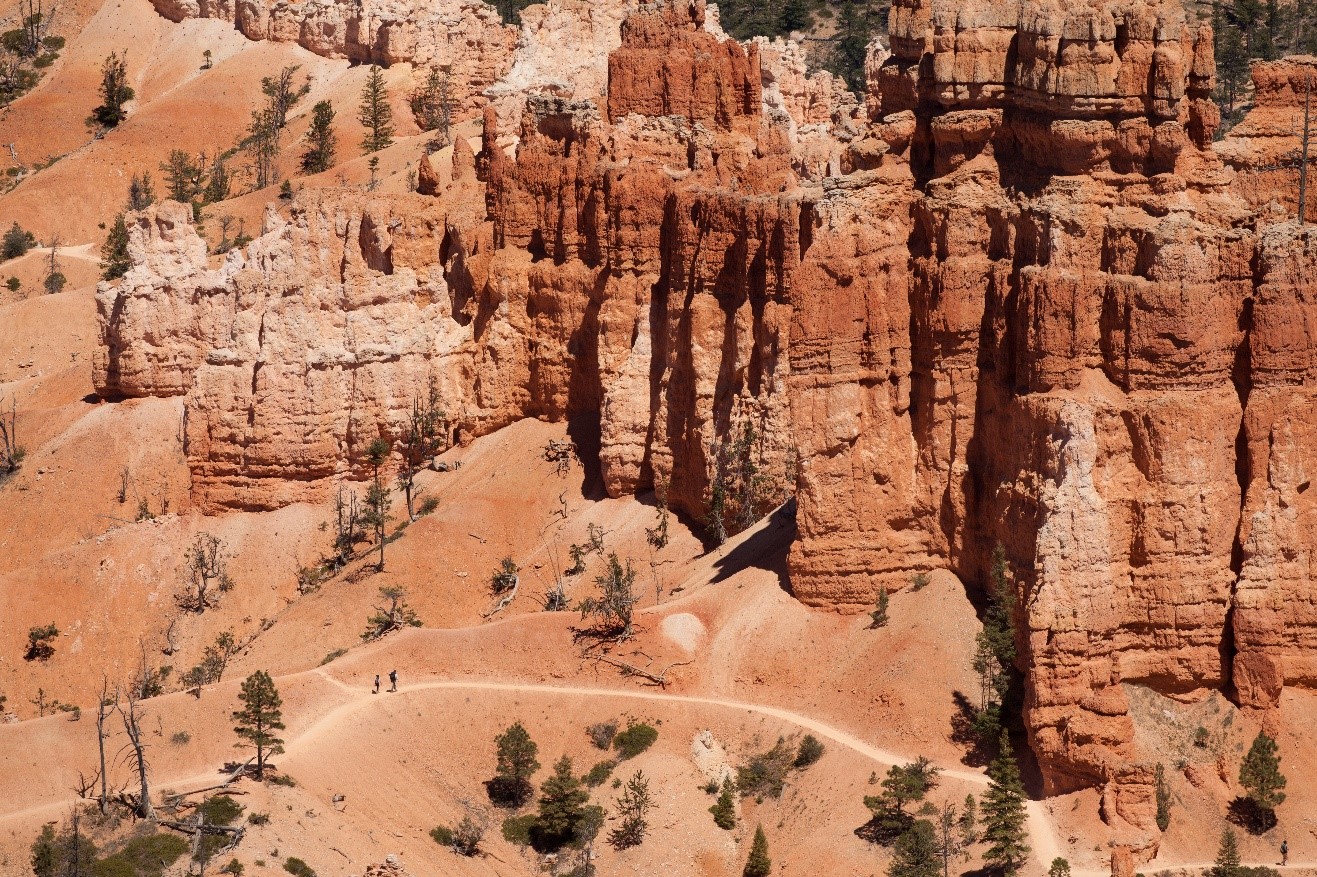 hikers are on a trail at the bottom of bryce canyon national park