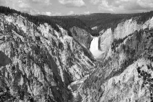 a black and white filter is placed over a photo of the grand canyon of yellowstone