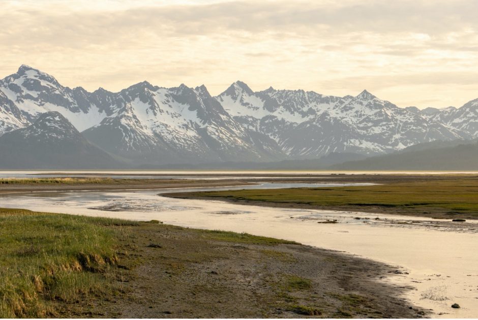 golden light shines on the mountains in Alaska