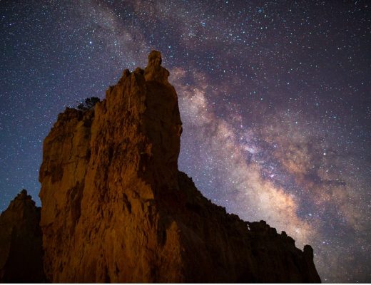 a night photo of bryce canyon national park with milky way in the sky