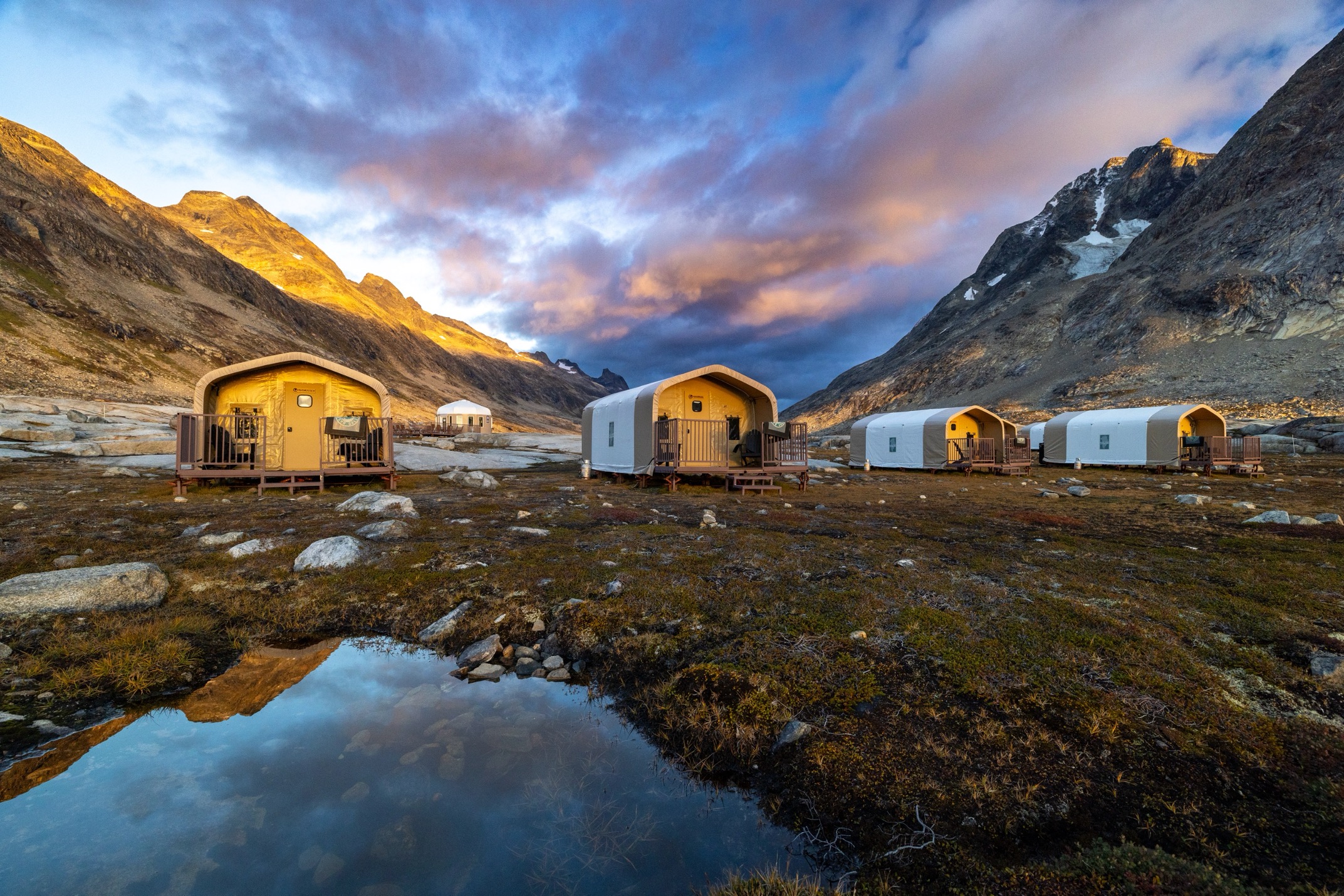 a camp sits on the shores of Greenland